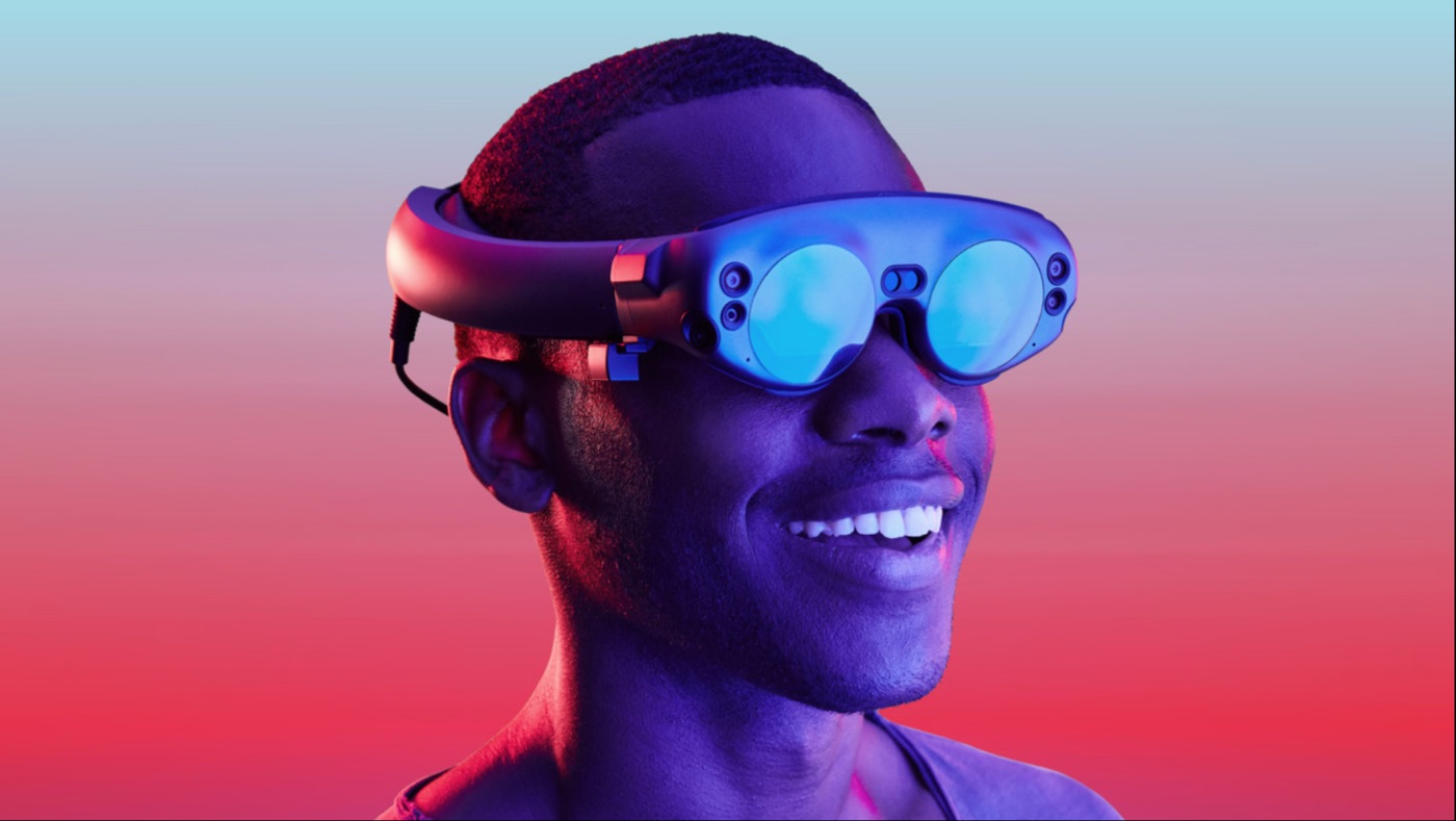 A person smiling while wearing a Magic Leap headset